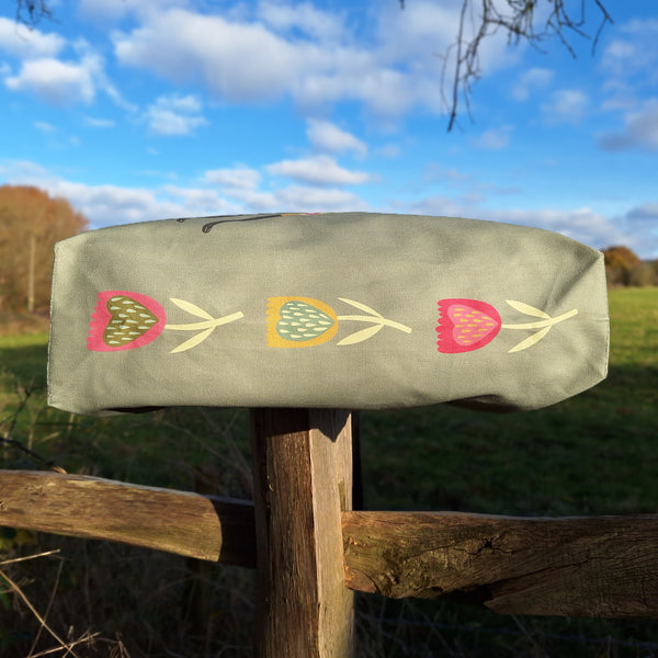 The base of a Sleep Sighthounds tote bag, showing the tulip design