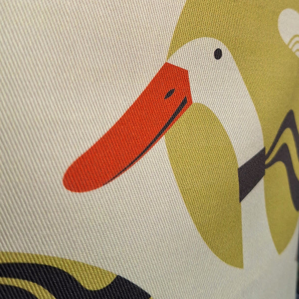 Close up view of the fabric of a Rollerdog Derbyshire Ducks apron