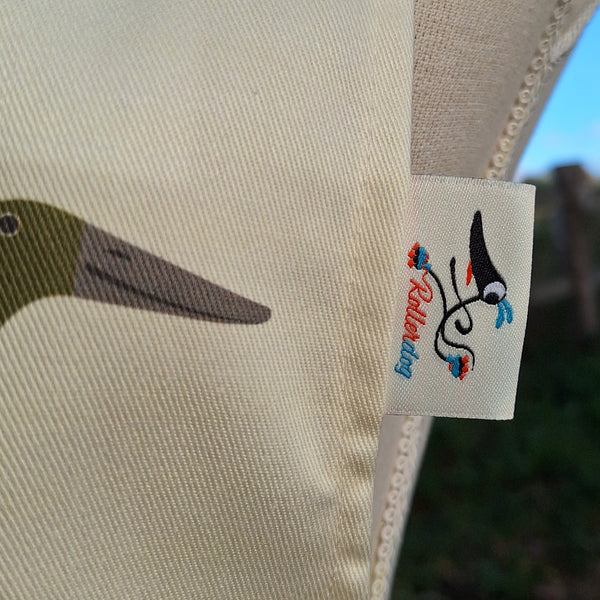 Close up view of a Derbyshire Ducks apron, showing the embroidered Rollerdog sew-in label