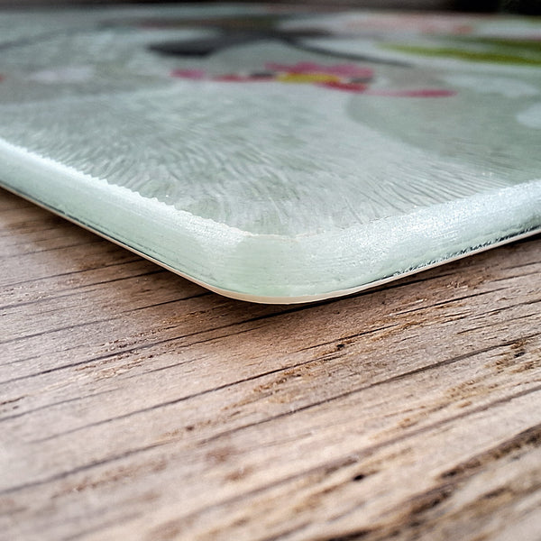 Close up of the corner of a Rollerdog chopping board, showing the thickness and texture of the board