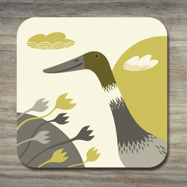 The stripy duck from Rollerdog's Derbyshire Ducks coaster collection, photographed on a wooden surface