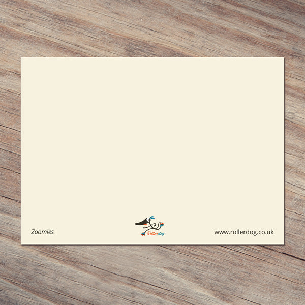 The back of a Zoomies postcard by Rollerdog