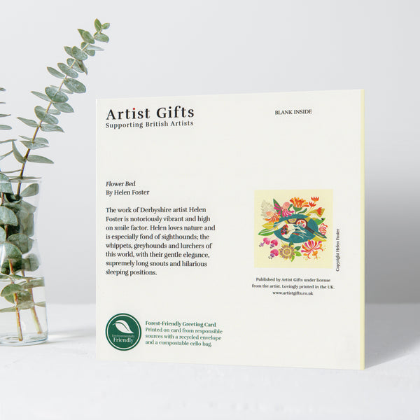 The back view of a Flower Bed greeting card by Rollerdog, containing text describing the artist's work