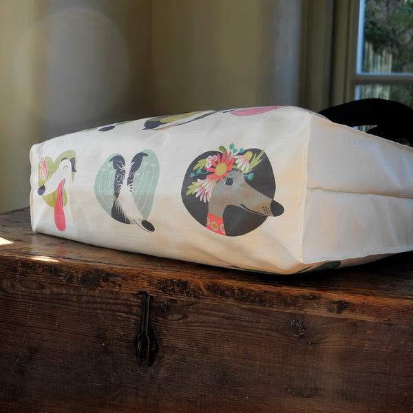 The base of a Noses & Poses tote bag, showing the printed artwork