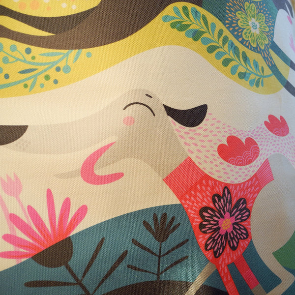 Close up view of a Zoomies tote bag showing the cotton fabric
