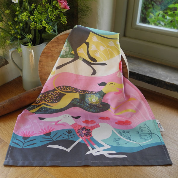 Zoomies tea towel by Rollerdog