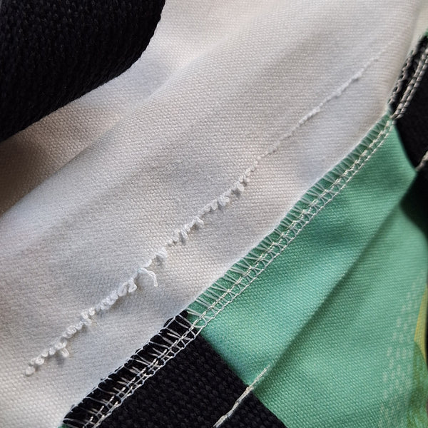 Close up of the flaw in the fabric on the inside of the bag