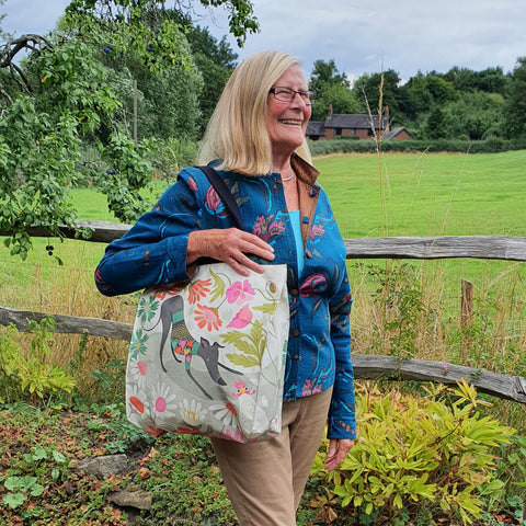 Greta tote bag by Rollerdog, shown in use as a shoulder bag