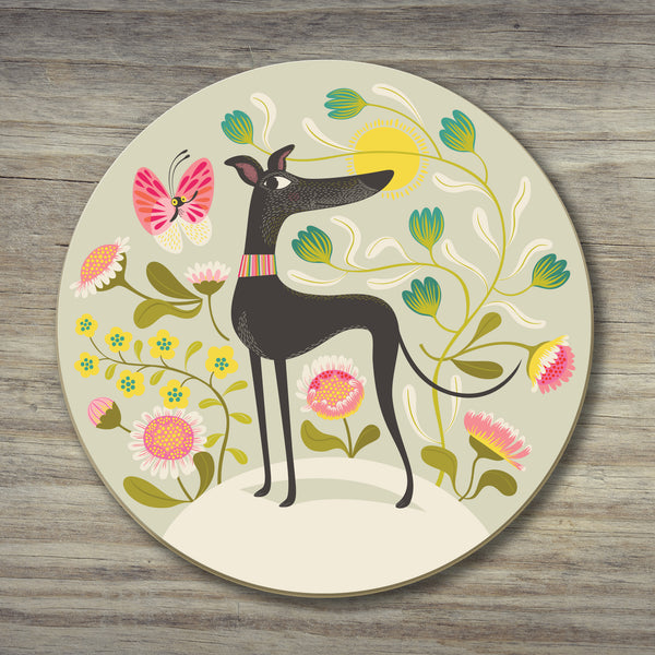 Freddie the Tripod coaster by Rollerdog, showing an illustrated greyhound with three legs, a butterfly and flowers