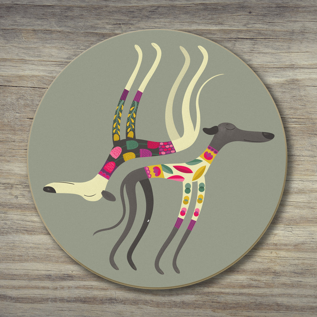 A single Sleepy Sighthounds coaster, showing an example of a second, in this case a small white print fleck on the design