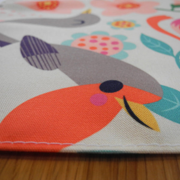 Close up of the fabric of a Bright Birds Apron by Rollerdog