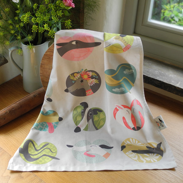Noses & Poses tea towel by Rollerdog