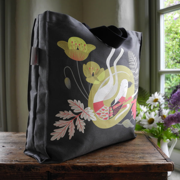 The front and side of a Rollerdog tote bag featuring Poppy the greyhound