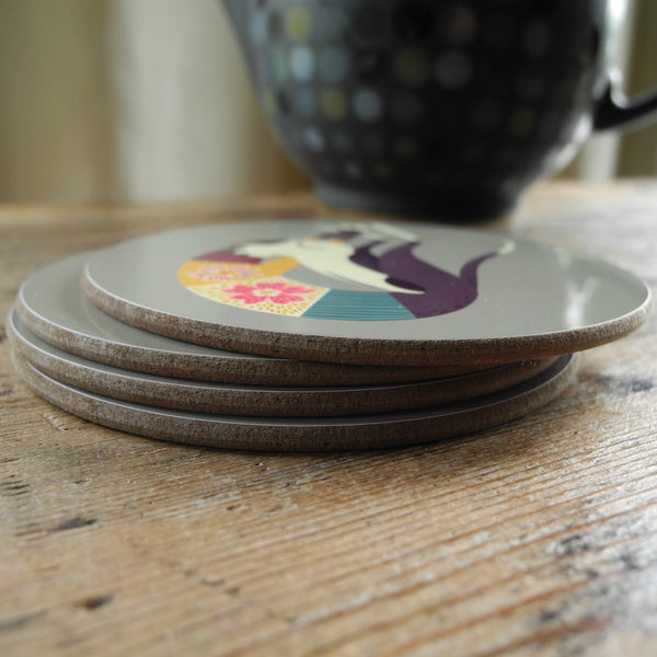 A stack of 4 Rollerdog Fred the Whippet coasters